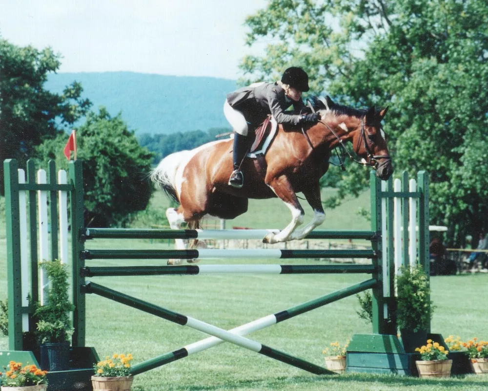 Dam’s Dam- Lacey jumping 5’6 at Upperville 6-bar 2001